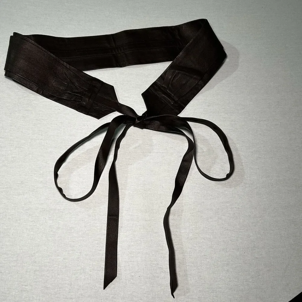 brown leather waist belt, featuring a wrap-around tie design